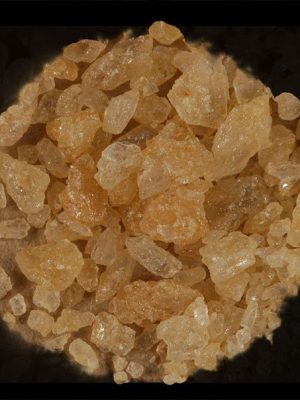 98% Pure MDMA Crystal arranged on black cloth; high-purity premium MDMA Crystal from Psychedelic Deals.